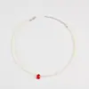 El nuevo producto transfronterizo de Amazon es un collar de perlas artificiales personalizado, sencillo y corto con un estilo moderno y de alta gama, y un dulce diseño de cadena para la clavícula.