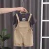 Traje de Verano de Manga Corta para Niños Nueva Llegada Estilo Occidental Bebé Calle Frita Celebridad de Internet Ropa Infantil Bolsillo Grande Tirantes Traje