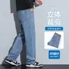 Venta al por mayor de jeans gruesos con forro polar para otoño e invierno para hombre, pantalones de pierna ancha de cintura alta, pantalones casuales de negocios rectos holgados y elásticos para hombre
