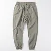 Calças masculinas de verão finas simples com amarração no tornozelo largas casuais calças de marca de moda elásticas seda gelo secagem rápida calças esportivas masculinas