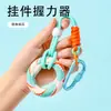 Entrenador de fuerza de agarre de silicona para ejercicios de mano, bola de agarre para entrenamiento de rehabilitación de dedos con alta resiliencia, viene con una correa para colgar y se puede sujetar a una mochila como un pequeño accesorio