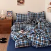 Ins Juego de cuatro piezas a rayas estilo MUJI simple gasa abullonada algodón puro tres piezas lujo ligero retro Maillard dormitorio juego de 3 piezas