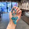 Llavero de arco de arcilla con diamantes completos, colgante de cadena de cuentas de cristal de moda, accesorio de bolso para chica dulce y genial, cadena para colgar el teléfono