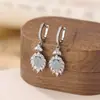 Un Ciervo Plata Esterlina S925 Huevo de Jade Azul Agua Cara Pluma Moda Creativo Lujo Ligero Diseño Moderno Pinza para Oreja Pendientes