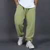 Pantalones deportivos casuales unisex de vellón grueso transfronterizos de Amazon, estilo europeo y americano, corte holgado, tallas grandes, pantalones jogger de color liso para otoño e invierno