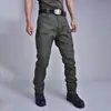 Calça Tática Ix7 Transfronteiriça Masculina Calça Longa Casual Outdoor Camuflada Calça de Caminhada Secagem Rápida Verão Impermeável Resistente ao Desgaste