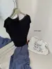 Wgwe9058 Guangzhou Shisanxing Moda Feminina Verão Novo Suéter de Tricô Off-Shoulder Solto Assimétrico Top Tendência