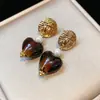 Modernos y Minimalistas Brazaletes para Oreja Retorcidos de Piedra Ojo de Tigre para Mujer, Pendientes Versátiles Vintage, Accesorios para Orejas de Otoño e Invierno con un Toque de Lujo Ligero y de Alta Gama