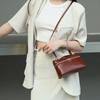 Bolsa Porta-Marmita de Couro Bovino Tonalizado na Primeira Camada para Mulheres 2026 Novo Estilo Simples Bolsa de Ombro Transversal Bolsa de Mão Maquiagem Pequena Quadrada 88809