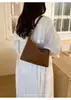Bolso tejido vintage transfronterizo para mujer, nuevo bolso cuadrado pequeño de moda de nicho para el verano 2026, elegante bolso cruzado para el día a día