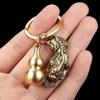 Estilo chinês latão feminino capa aberta sólida cabaça cheia de areia chaveiro criativo retrô pingente ornamentos portáteis