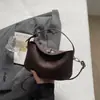 Bolso de Mano Relajado y Elegante Estilo Coreano, Bolso de Hombro Cruzado Fresco y Dulce de Nicho de Moda, Bolso Dumpling Moderno y Único