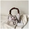 Bolsa de Mão com Estampa de Bolinhas Moda Transfronteiriça 2026 Nova Elegante e Única Bolsa de Ombro Transversal para Mulheres Pequena Quadrada