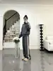 Conjunto deportivo casual estilo europeo para mujer, moda otoño e invierno 2026, corte ajustado, sudadera con bloques de color y pantalón ancho conjunto de dos piezas
