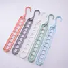 Perchero multifuncional, diseño de nueve agujeros, plegable, perchero para pantalones sin marcas, ideal para dormitorios y uso doméstico, una solución de almacenamiento y organización, tendedero giratorio