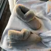 Simples y versátiles, cálidas y forradas de felpa, botas de nieve para mujer, nuevo estilo otoño/invierno 2026, cómodos y afelpados zapatos de algodón con cuero y piel integrados