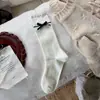 Songmuins meias de cano médio estilo coreano com laço outono e inverno meias longas de algodão estilo coreano sem costura