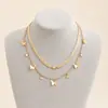 Collar de cadena de avión de doble capa con colgante de mariposa de aleación, experto en joyería transfronteriza europea y americana, collar de cadena de clavícula retro para mujer