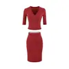 Atacado de roupas femininas transfronteiriças 2026 outono novo doce e picante gola V justa curta conjunto de saia midi elástica de cintura alta
