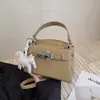 Bolso de Mano Transfronterizo 2025 Nueva Moda Bolso de Hombro Bandolera para Mujer Diseño Nicho de Alta Gama Bolso Kelly para Viaje