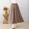 Colección Otoño 2026: Falda midi de cuadros de algodón y lino con cintura elástica, estilo artístico japonés, falda de línea A adelgazante para mujer
