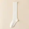 Calcetines de canalé para mujer, color liso, simples, versátiles, estilo Lolita, para primavera y otoño, combinados con zapatos de piel pequeños, hechos de algodón peinado, calcetines largos apilados