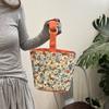 Bolso de mano casual para el día a día, bolso tote de tela floral simple y moderno, nuevo bolso de hombro simple de moda para el verano 2024