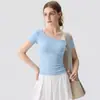 Roupa de Yoga para Mulheres 2026 Novo Estilo de Verão com Bojos Integrados Falso Conjunto de Duas Peças Manga Curta Top Esportivo de Pilates Fitness
