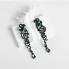 Pendientes Amazon transfronterizos, extragrandes, electrochapados, elegantes, de estilo largo, con un toque de alta gama, adornados con borlas y pedrería negra