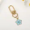 Llavero Dulce y Colorido de Flor de Cerezo Estilo Coreano Simple Ins Alto Valor Colgante Floral Fresco para Mochila