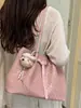 Bolso de mano grande para mujer, modelo nuevo de verano 2026, alto valor estético, color sólido, único, tejido de nicho para la ciudad