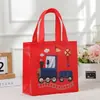 Bolsa de regalo con temática de tren de dibujos animados, bolsa de tela no tejida, bolsa de mano para fiesta de señales de tráfico al por mayor