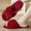 Otoño e invierno color sólido cruzado nuevas zapatillas de algodón moda hogar damas felpa cálida ventas transfronterizas zapatillas de algodón