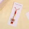 Colgante para teléfono móvil de danza del león de bendición, accesorio para bolso y llavero de coche, colgante auspicioso de hilo rojo estilo chino, disponible para venta al por mayor