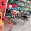 Mesa y sillas de patio Mesa y sillas de comedor para exteriores Conveniente para insertar sombrillas Entrada de tienda Entrada de supermercado Parque de atracciones Mesa integrada Mesa de postres y taburetes