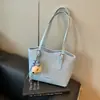 Bolso de hombro grande minimalista transfronterizo para mujer, nuevo bolso de moda 2026 para estudiante universitario, bolso tote de gran capacidad para verano
