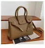 Estilo explosivo de moda transfronteiriça bolsa grande de mão feminina 2026 nova bolsa vermelha de casamento da moda bolsa tote transversal de grande capacidade