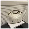 Bolsa de Axila de Nicho Moda Casual de Mano Pequeña para Otoño e Invierno 2025 para Mujer Nueva Bolso Plegado de Diamante para Almacenamiento de Maquillaje