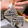 Llavero de poni de diamantes lindo coreano para mujer, llavero creativo para llaves de coche, colgante de bolso de moda, regalo al por mayor