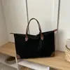 Bolsa Grande Capacidade Transfronteiriça Feminina Outono 2026 Nova Versátil Moda Ombro Único Tendência Trabalho Retro Casual Bolsa Tote
