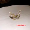 2026 Nuevo Popular Brazalete de Oreja Mariposa con Circonita para Orejas sin Perforar, Pendientes de Clip para Oreja Estilo Minimalista de Lujo Ligero para Mujer