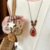 Polvo de Caramelo~Nuevo Collar Colgante de Estrella China de Cinco Puntas para Mujer 2026 Nuevo Estilo Estilo Festivo Accesorios de Nicho Únicos