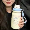 Taza aislada linda con temática de gato y compartimento para té, con cordón portátil, hecha de acero inoxidable 316, adecuada para estudiantes, y disponible para venta al por mayor y pedidos personalizados.