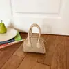 Mini Bolso de Bowling Estampado de Leopardo Transfronterizo Gama Alta Nicho Lujo Ligero Cartera de Monedas de Gama Alta Accesorios Bolso Cruzado Versátil para Niños