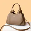 Bolso de mano para mujer transfronterizo, nuevo bolso tote pequeño popular, exquisito y de alta gama, bolso de hombro de lujo ligero, bolso de axila para el trabajo