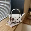 Bolso de mano patchwork de mezclilla lavada estilo americano y piel sintética, versátil para el uso diario, bolso ligero para mujer de hombro y cruzado