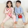 Otoño e invierno 2022 nuevo traje de ropa de otoño de terciopelo transpirable elástico suave para niños con rayas, superficie AB, ropa interior térmica para niños