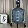 Nueva chaqueta deportiva de botones estilo chino para hombre, con cuello mao, tres rayas y un diseño retro de traje Tang, adecuada para uso casual de primavera y otoño