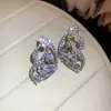 Pendientes de botón de plata con incrustaciones de diamante, diseño redondo, gota de agua y ala, de venta caliente en Europa y América, pendientes de moda para el trabajo, adornos para la oreja de diseño nicho para mujer