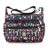 Venta al por mayor de fábrica bolsa de tela de color de nailon para mujer de gran capacidad tipo albóndiga bolsa de tela grande bolsa de hombro para mujer bolsa de compras